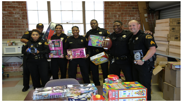Photo of Officers with Gifts